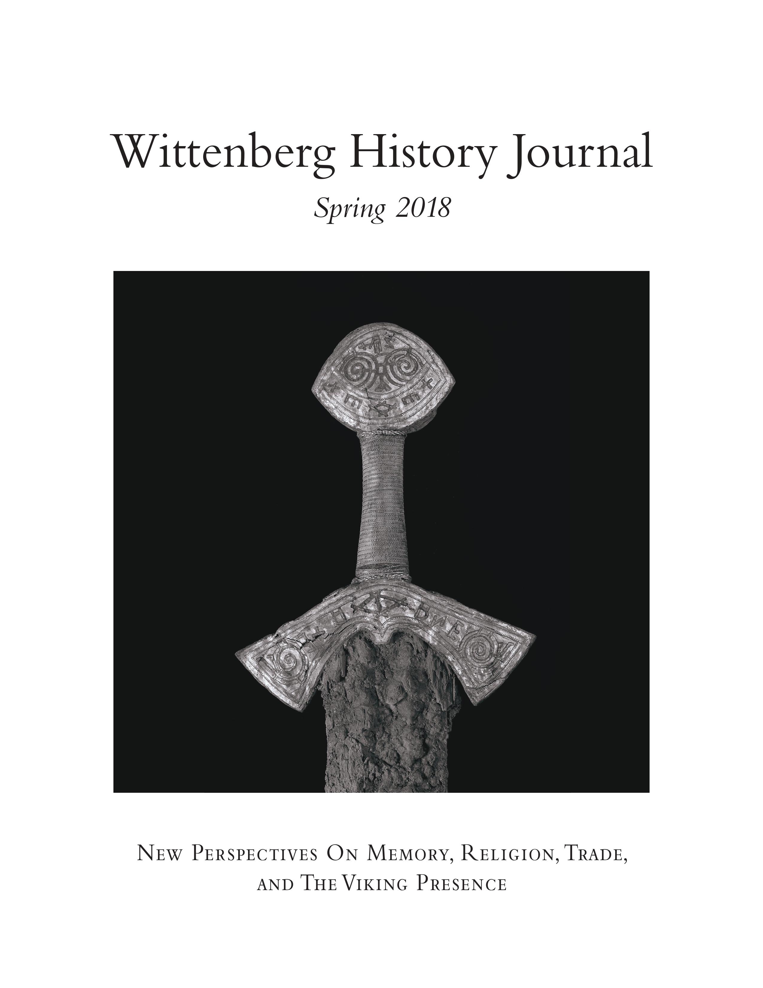 Black and white photograph of the hilt of a Viking-era sword